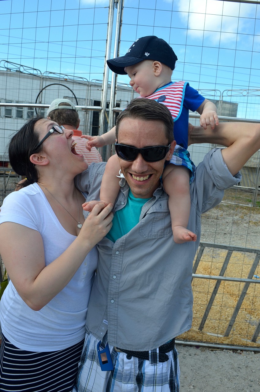 Katie, Brayden and Brent Dupuis play around.