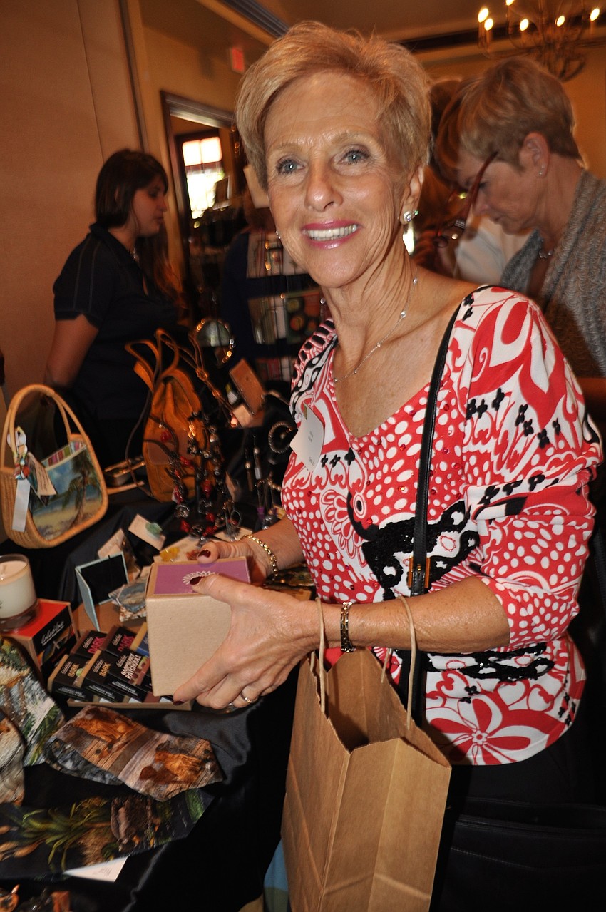 Wilma Nourie looks at items made by Ringling College or Art and Design students and almuni.