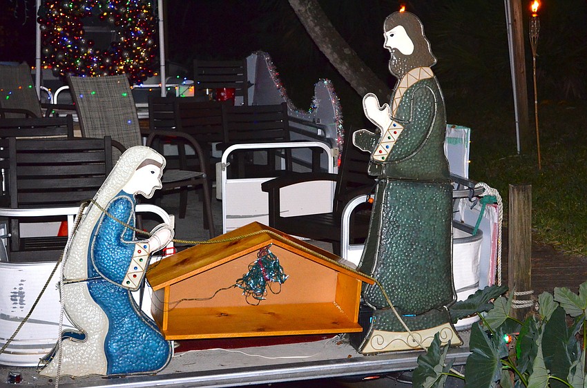 Some boats featured Christmas symbols such as the nativity scene.