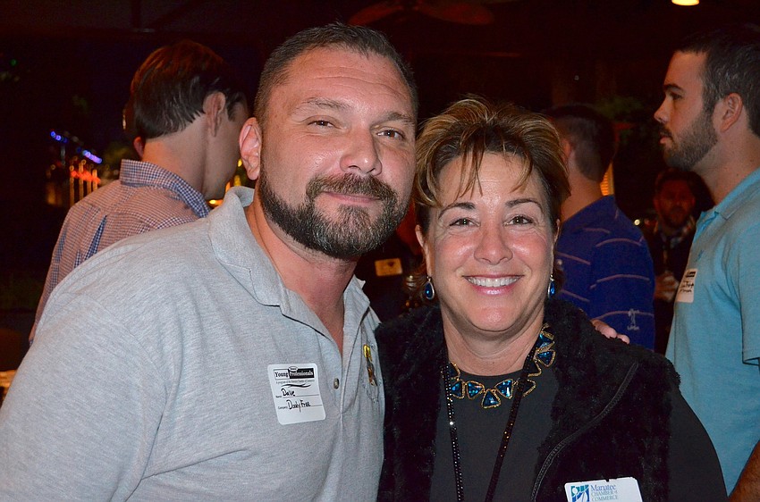 Dave Karshick and Allison Heitner, of the Manatee Chamber of Commerce, are all smiles.