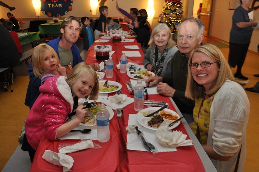 Clockwise from front left are: Amelia, Madeline and Brian Cooper, Dinah and Tom Hoppe and Cindy Cooper.