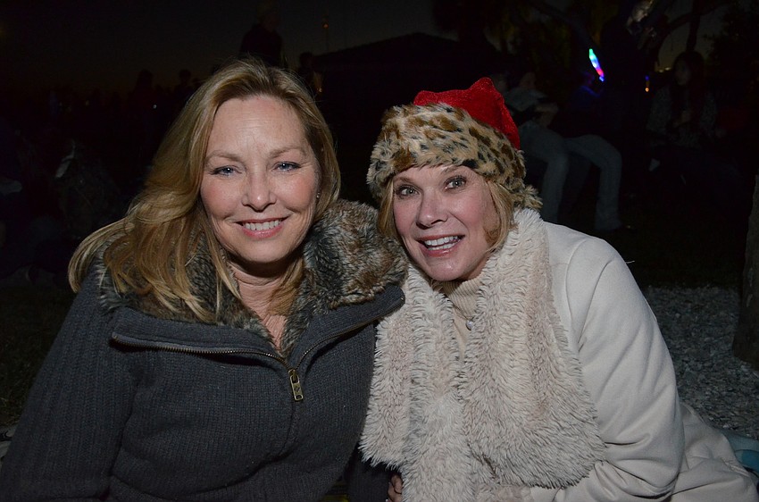 Terre Rossnagle and Leslie Sharp wait for the boat parade at Bayfront Park.