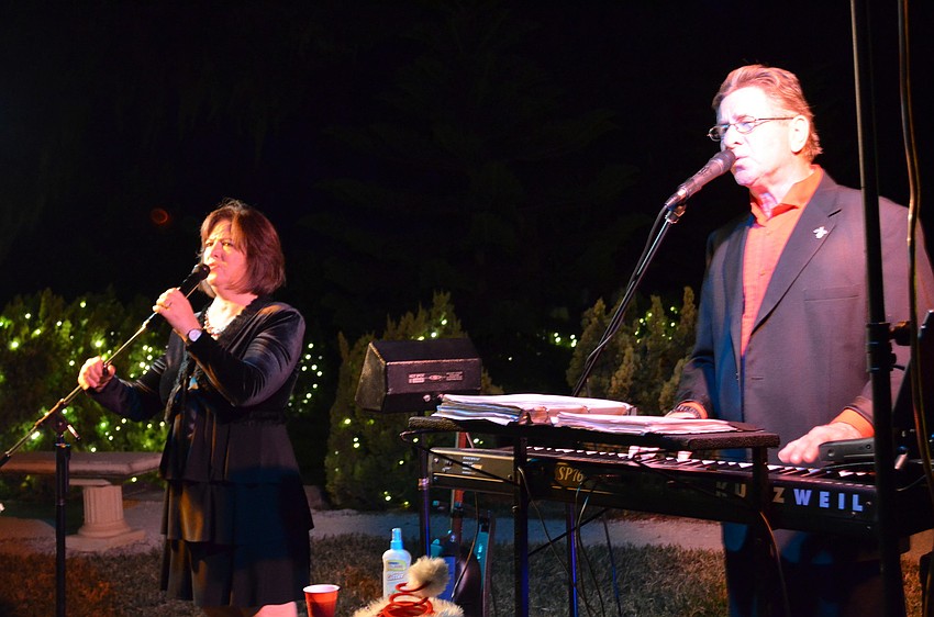 Performers of MCSquared provided live music and entertainment for guests at the Holly Holiday Party.