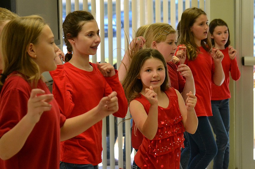 Students from the Bay Haven School of Basic Plus Broadway club perform for residents at the Jefferson Center of Sarasota.