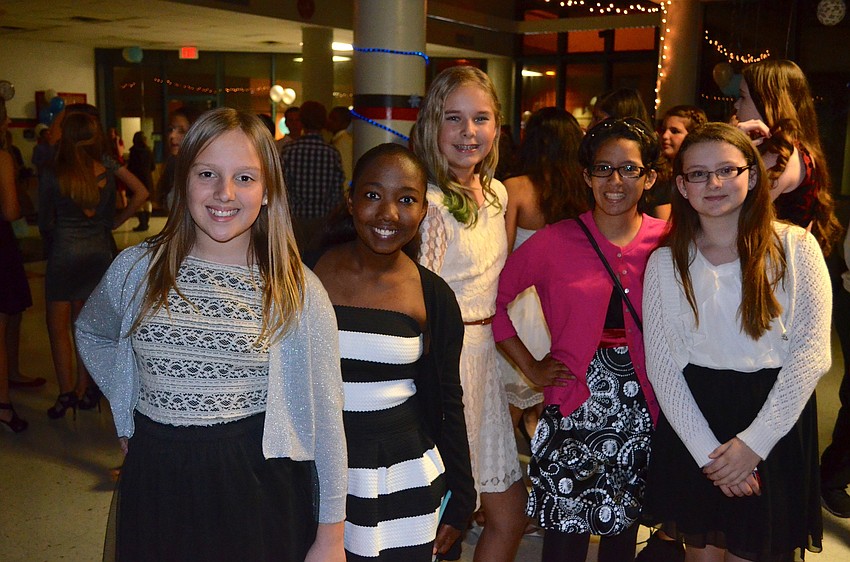 Carolyn Rozensky, Reina Langley, Sasha Krill, Liliana Collado and Lydia Taylor enjoy time with friends.