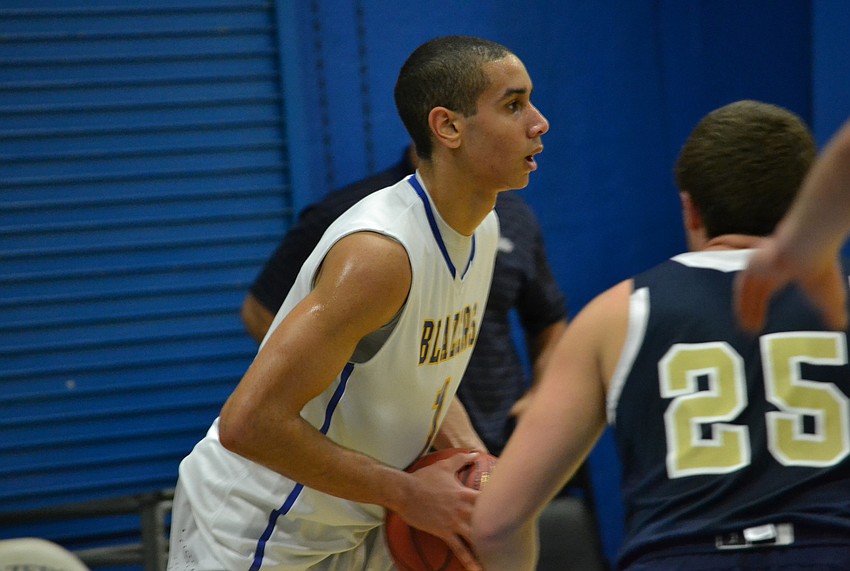 Emanuel Lambright looks for an open teammate.