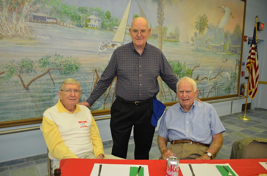 Jim Loftis, Msgr. Gerry Finegan and John Rutledge