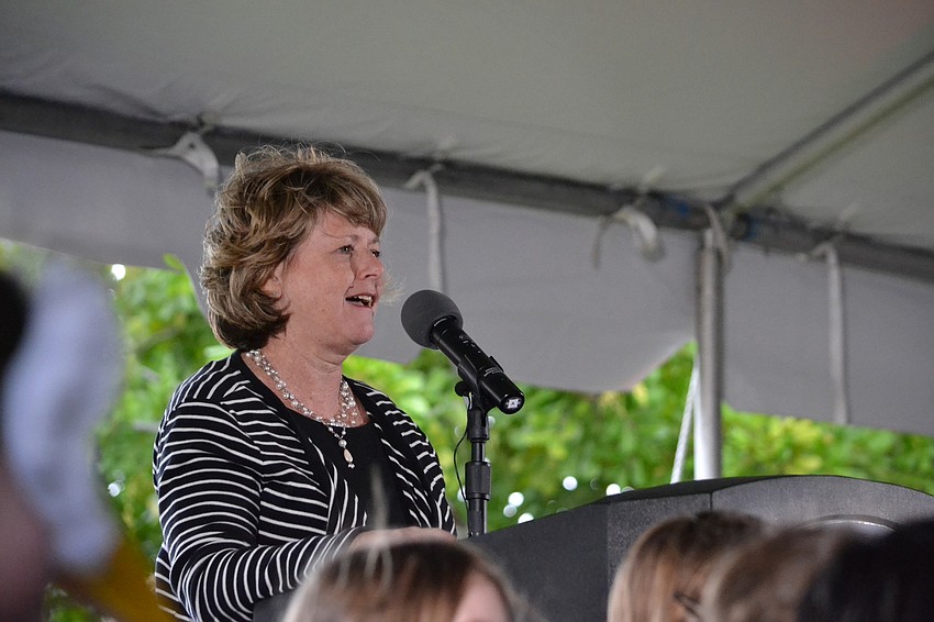 Director of Libraries and Historical Resources, Sarabeth Kalajian greets members of the community to the opening of the new Gulf Gate Library.