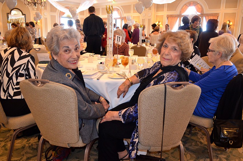 Club historian Joan Franzel waits for lunch to be served, alongside her friend, Marian Morris.