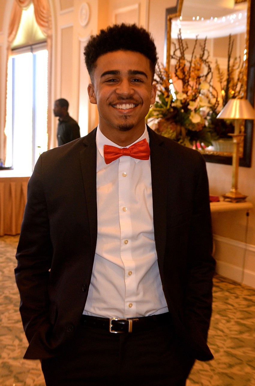 Seventeen-year-old Christopher Eisenberg performed soul, Motown and jazz classics during the luncheon.