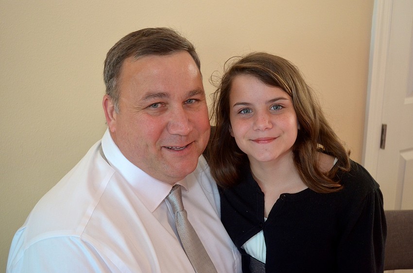 Curtis Nickerson spends time with his daughter, Emily.