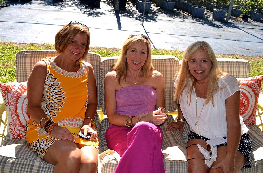 Anna Fetter, Lindsey Bryan and Pam Oldham enjoy girl time before dinner.