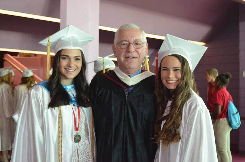Gabby Ojeda and Hannah McDevvitt with their teacher, Bob Fottler