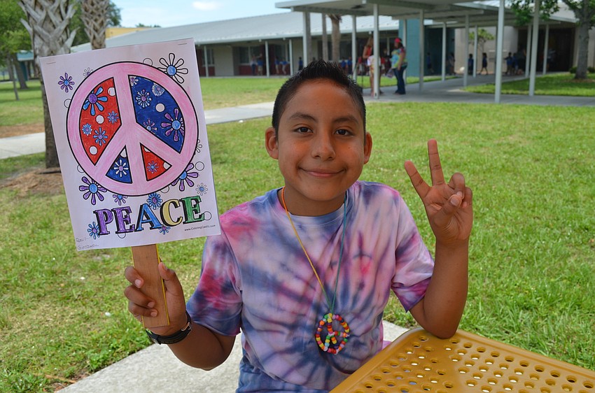 Raul Gonzalez takes a break from walking.