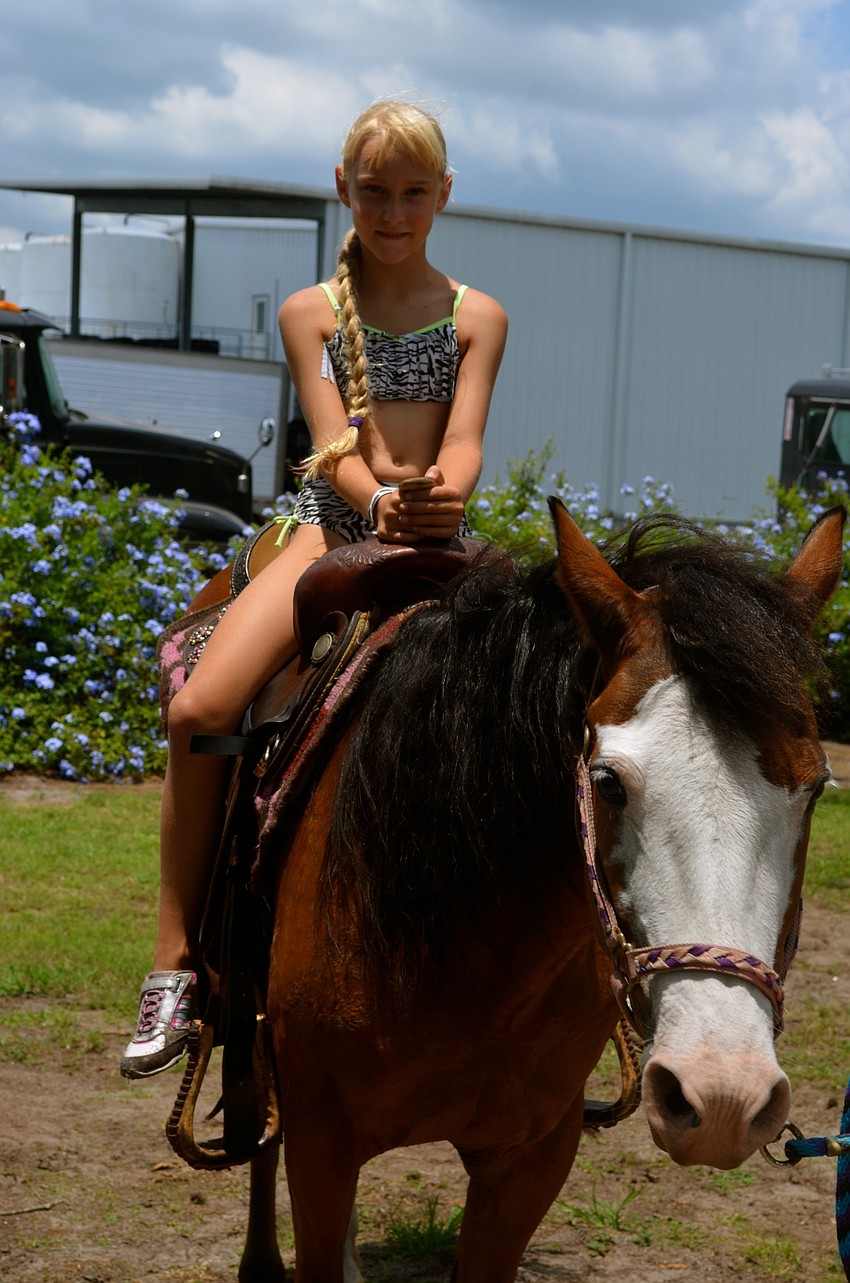 Sheila Williamson rides Patch around the property.