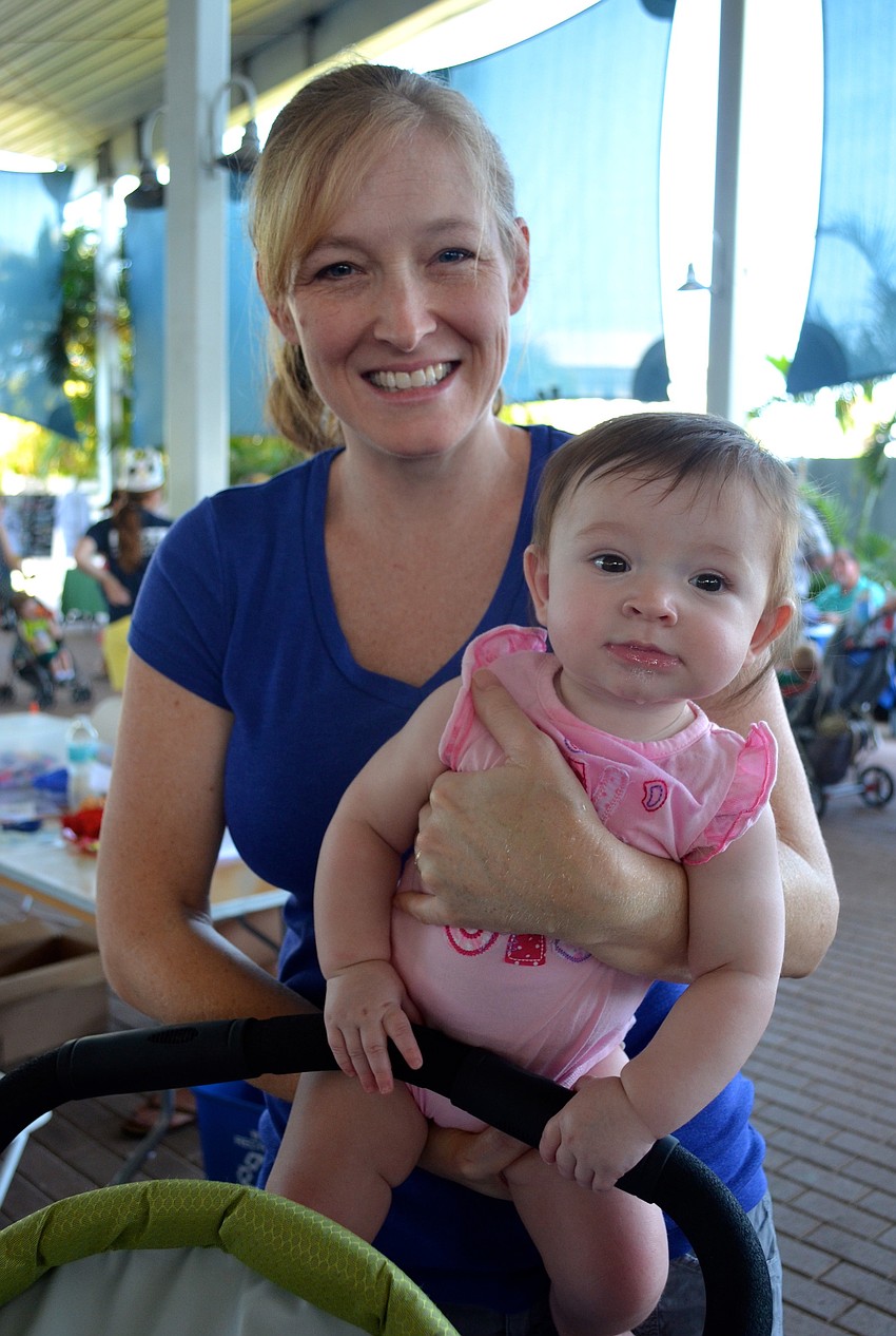 Kim Griffin holds her 7-month-old daughter, Kylie