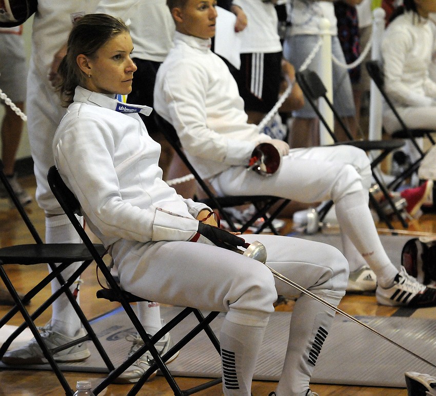 Tatsiana Yelizarova of Belarus waits her turn to take the piste, or fencing mat, which is 46 feet long.