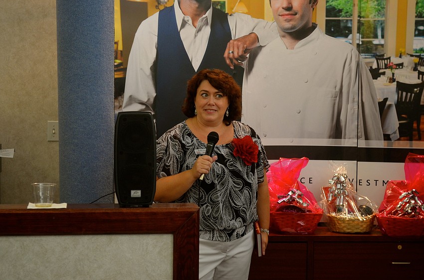 Kelly Jackson announces prize winners.