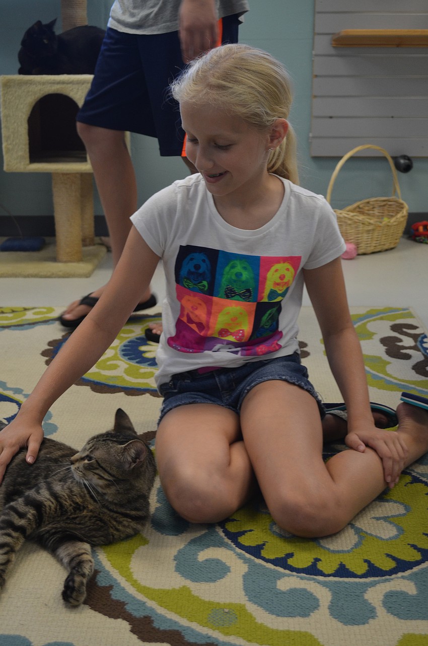 Claire Maags plays with Oâ€™Mally.