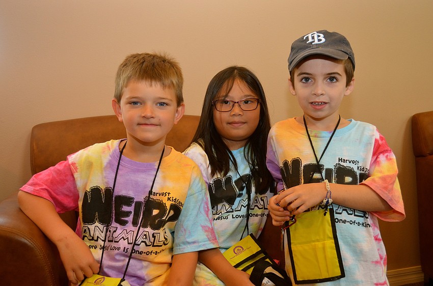 Tristen Birkley, Katie Tang and Foster Smith make new friends.