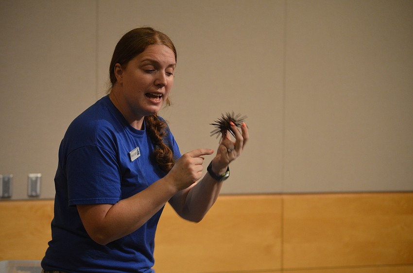 Heather Segura teaches the children about sea urchins.
