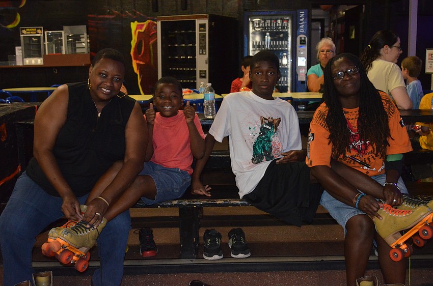 Jauana Johson, Clermont Dauphin and Xavier and Trina Gray lace up.