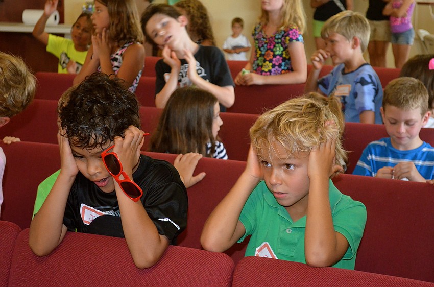 Jesus Mendoza and Owen Jones dance around during song time.