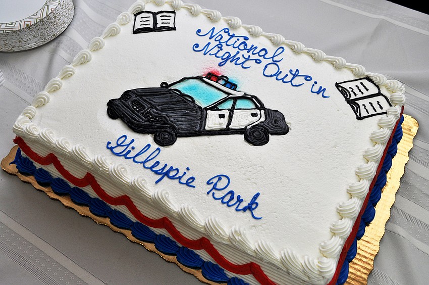 Cake was served to guests at National Night Out Against Crime at Gillespie Park. â€œWe are throwing crime a going away party,â€ says Gillespie Parkâ€™s crime prevention officer Cherie McKeon.