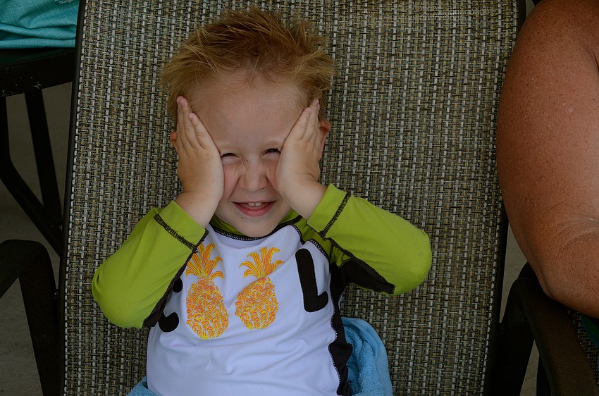 Easton Gonzalez plays peek-a-boo.