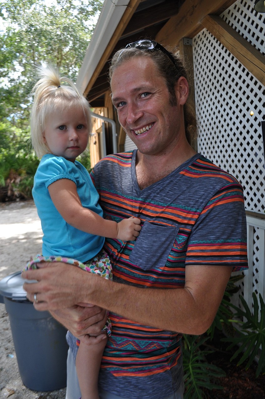 Two-year-old Amelia Wiley helped her dad, Alex, celebrate his 36th birthday.