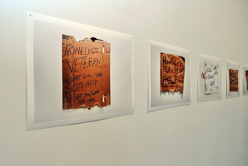 Sally Pettibonâ€™s â€˜Flying a Signâ€™ exhibition at Two Columns Gallery features photographs of unique signs from people asking for money on the side of the street.