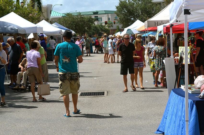 Main Street welcomes its first farmer's market in three years.