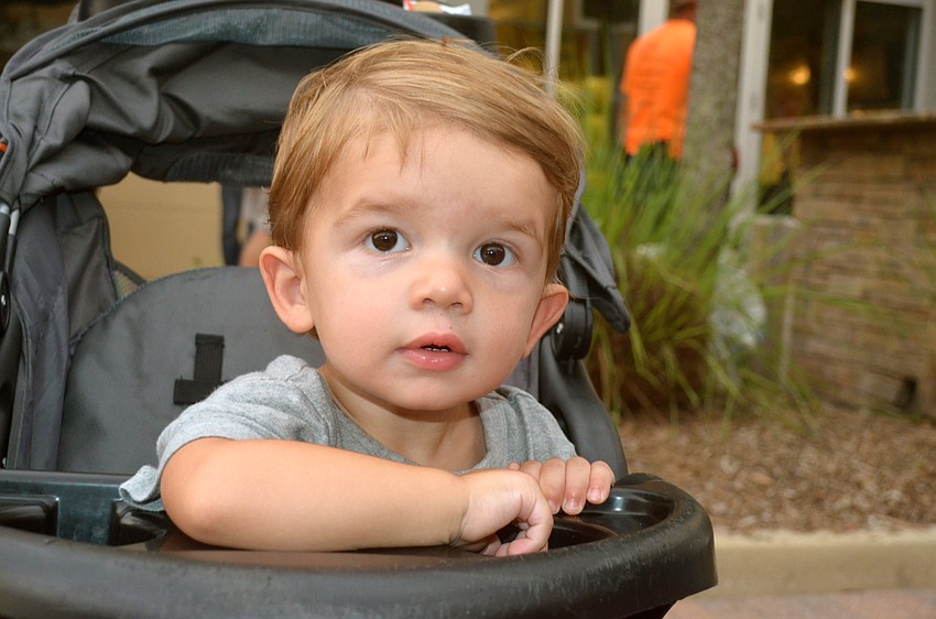 Carson Smith rides around the event in style.