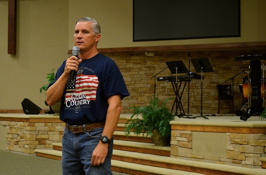 Providence Community School Principal Barry Batson talks to students about Sept. 11.