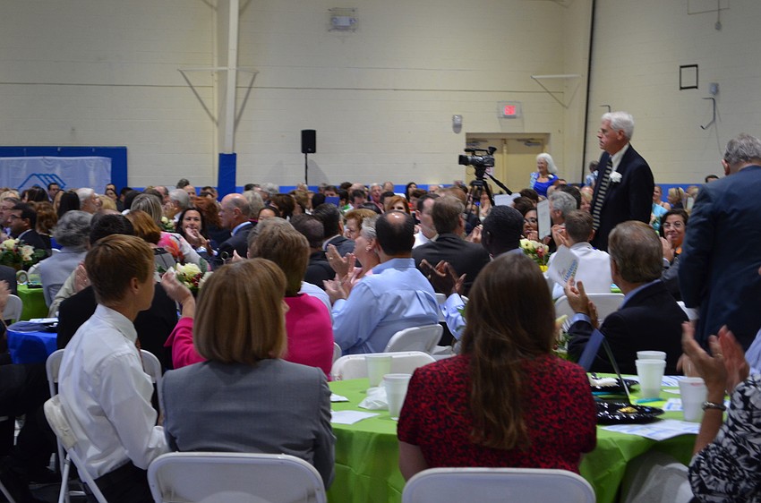 The audience takes a moment to recognize past Leadership Award honorees.