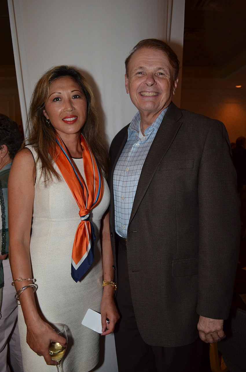 Ping Faulhaber with 2012 Boundary Crosser Award recipient and Ringling College president, Larry Thompson.