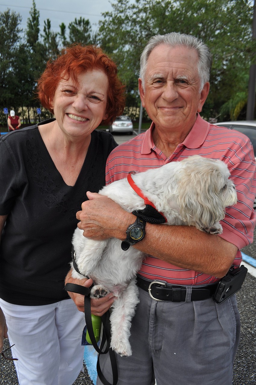 Annette and Charles Soklash show off Yoshi.