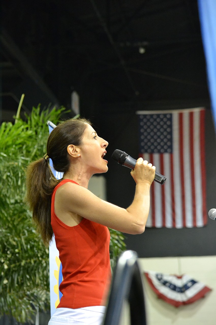 Robin Fernandez sang the national anthem for the picnic.