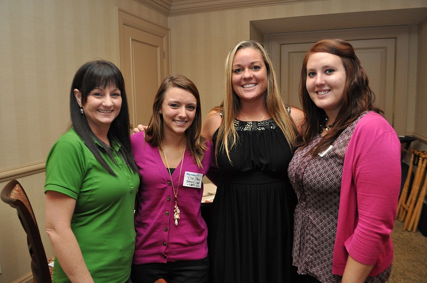 Toni Booth, Ellie Sharp, Heather Andrews and Misty Hamilton sit at the same table.