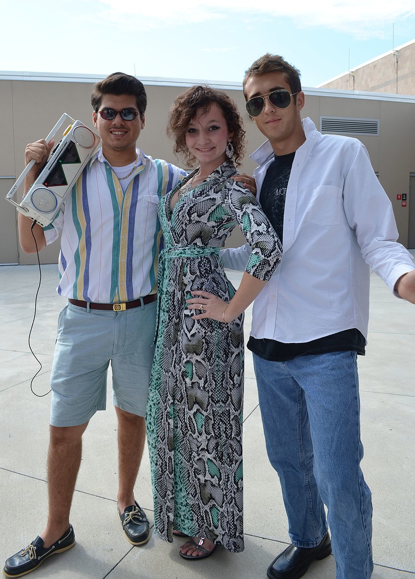 Pablo Infante, Abbie Hodgson and Ryan Bausback kicked it old school and dressed in 1980s attire.