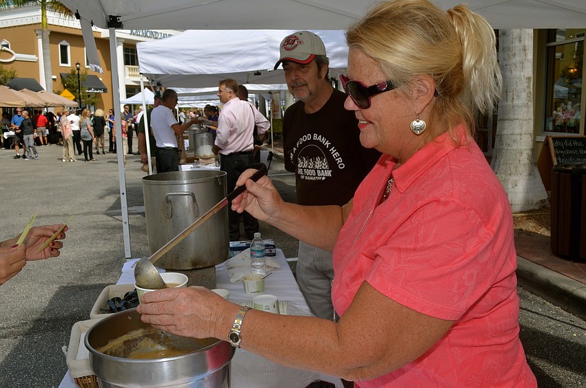 Barbara Punta, of 2nd Street Bistro, serves soup for a cause.