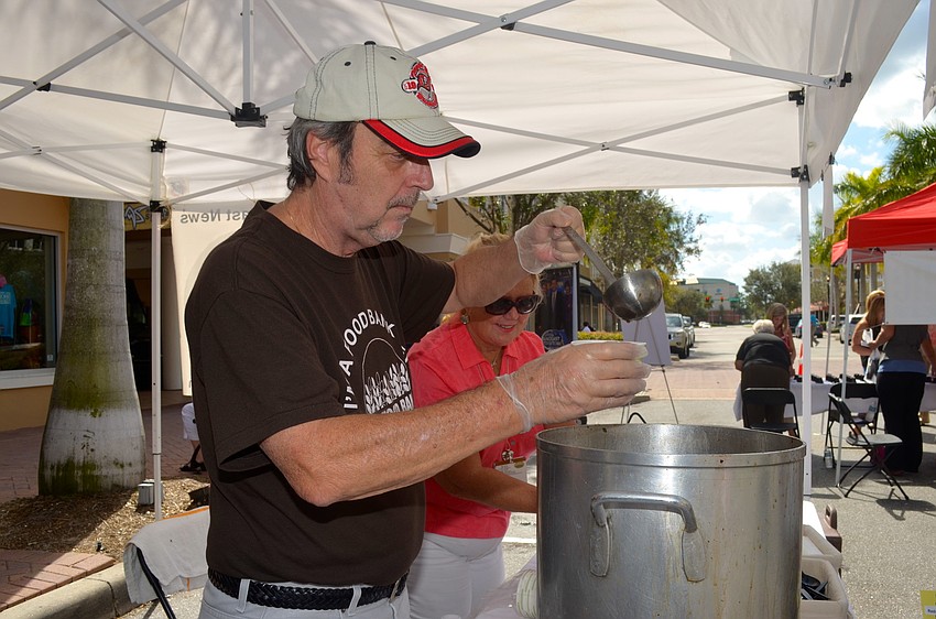 Joe Angers serves up a beef barley with wild mushrooms soup.