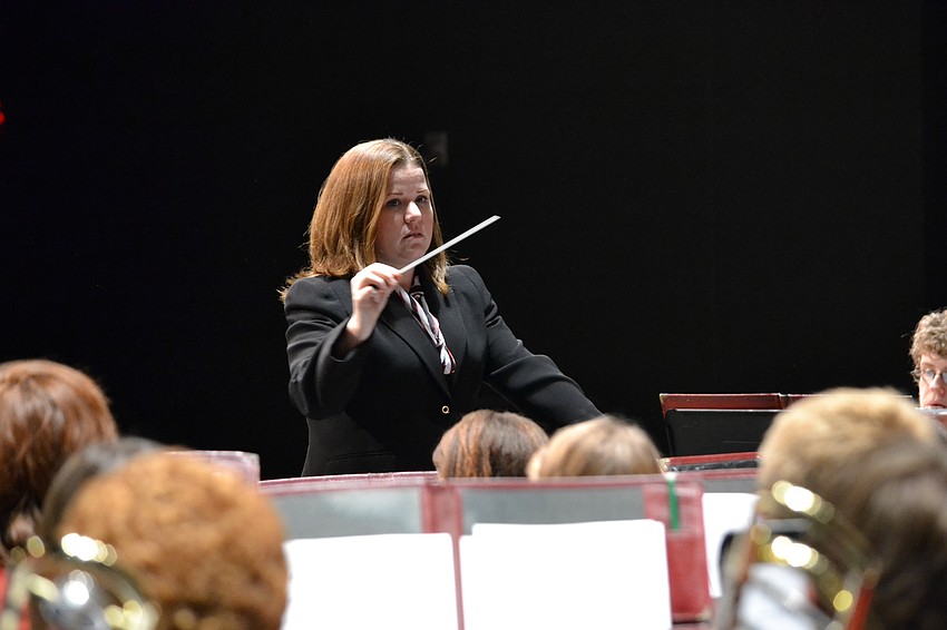 Sarasota Middle School band director, Tamara Lewis directs the wind ensemble that included members of the SMS advanced band.