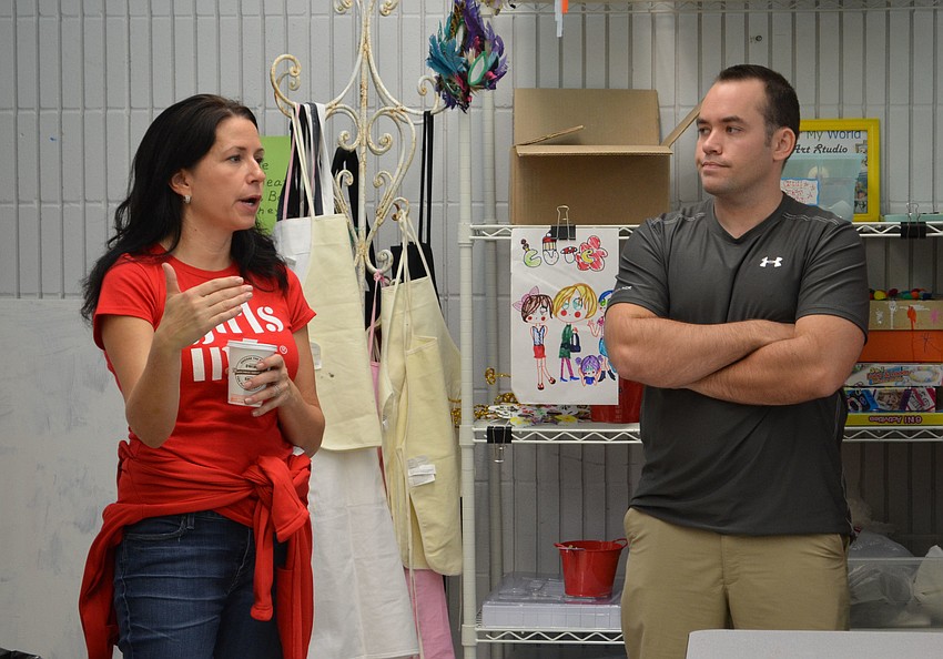 Director of Community Relations at Girls Inc. Kay Mathers gives a tour of the facilities to YPG members