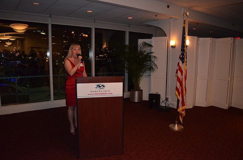 Deborah Miller sings the National Anthem.