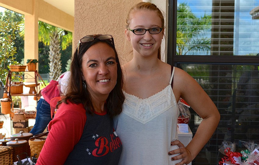 Stacy Kolbe and Mackenzie Goda, of Beauti Control, sell cosmetics and other products at the event.