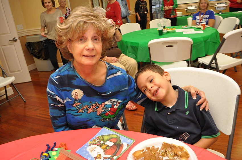 Marie Meyers attends with her grandson, Andrew Fertig, 5.