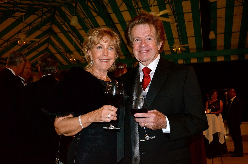 Peggy and Justin Judd toast to a night of dancing and food.