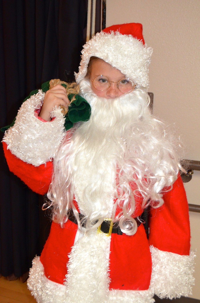 Ally Frank plays Santa Claus.