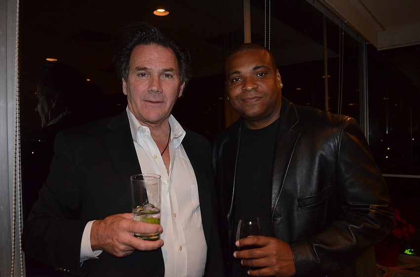 Jerry Cunningham, of Keller Williams, and Rassa Eddie, of SRQ Auto